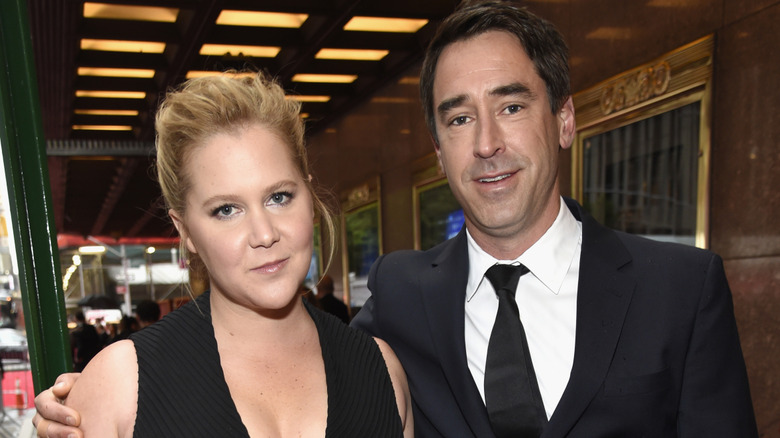 Amy Schumer et Chris Fischer lors d'un événement