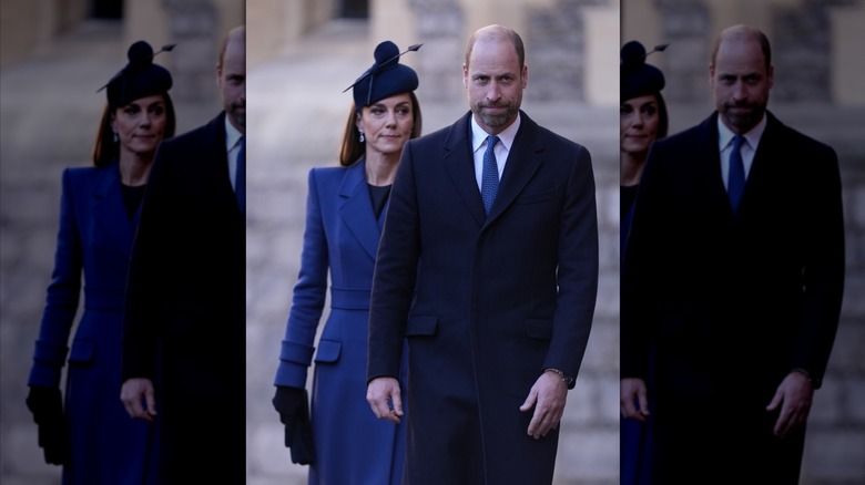 Kate Middleton dans un manteau bleu marchant derrière le prince William dans un costume bleu marine