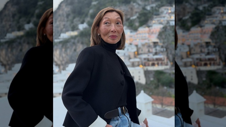 L'influenceur mode Gym Tan pose pour une photo pendant ses vacances en Italie