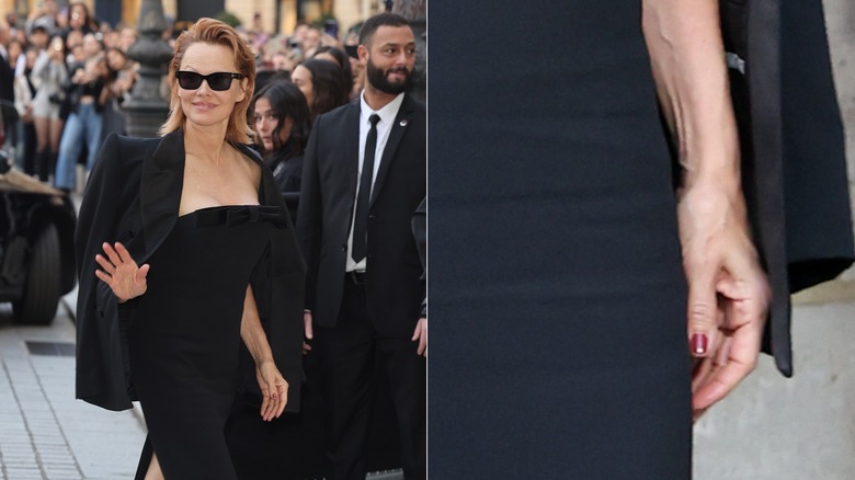 Un plan lointain et un gros plan de Pamela Anderson à Paris en noir avec des ongles rouges