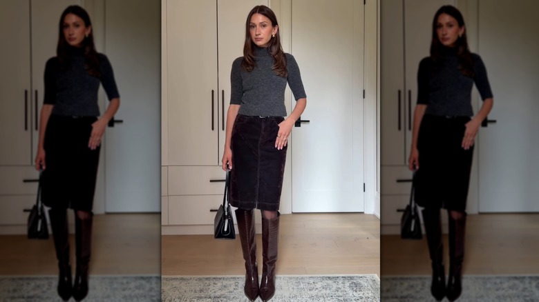 Vue directe d'une femme portant une jupe jusqu'aux genoux et des bottes