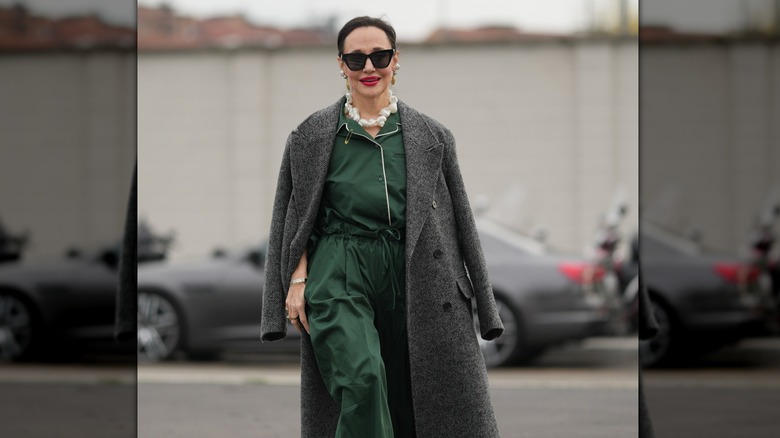 Un invité au défilé Homme automne/hiver 2026-2027, le 18 janvier 2026 à Milan, Italie