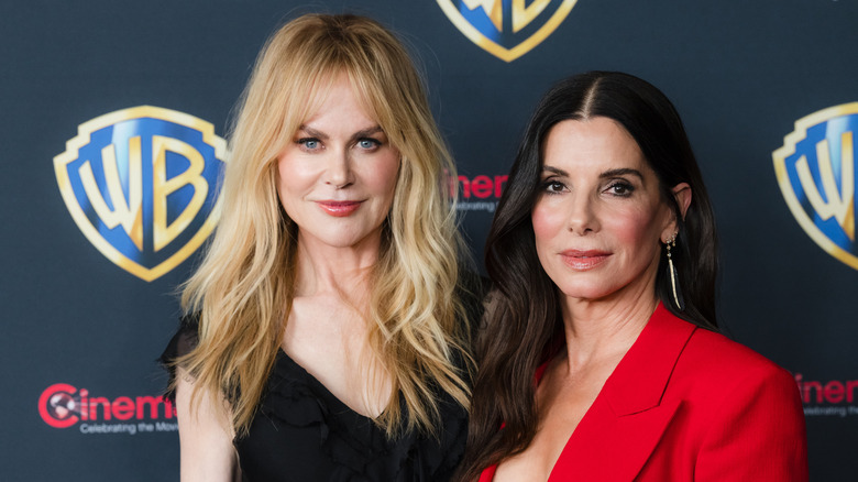 Sandra Bullock et Nicole Kidman photographiées souriantes sur le tapis rouge en 2026